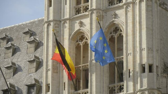 Belgian and EU Flags on Brussels Town Hall. High quality video footage
