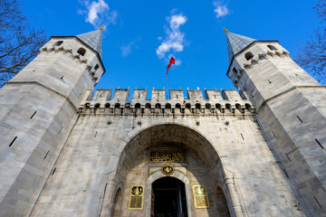 Classic wide-angle front view of ancient Topkapi Palace in Istanbul.