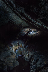 underground river inside of Han-sur-Lesse cave grotto, Belgium
