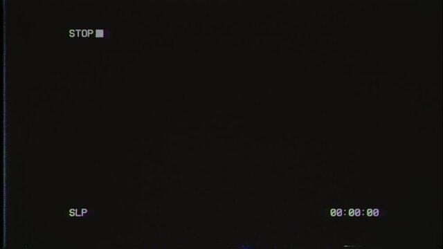 VCR Stop button interface overlay. VHS defects, artefact and noise. Glitches of old damaged tape cassettes. Static TV noise. Overlay Screen mode footage