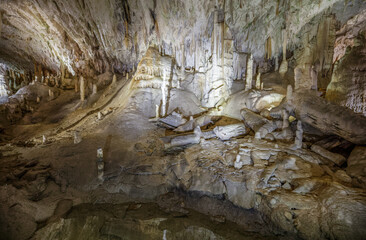 Postojna cave, Slovenia. Formations inside cave with stalactites and stalagmites.