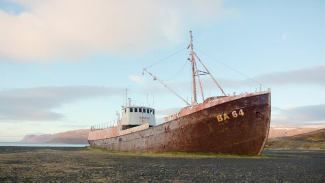 View of the shipwreck and the volcanic landscape , Icelandic ghost ship Gardar BA 64