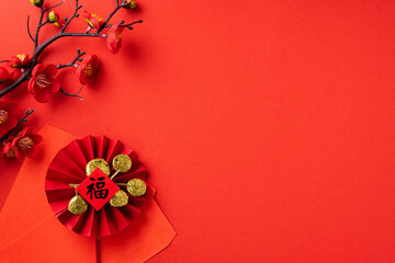 Chinese lunar new year background design concept with red cherry blossom and festive decoration.