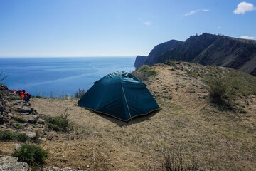 Tent on the rocky coast of Olkhon Island