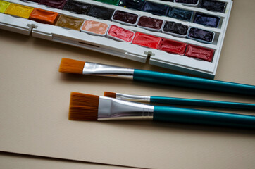 Obraz premium Multi tools artists paint brushes the watercolor box paints