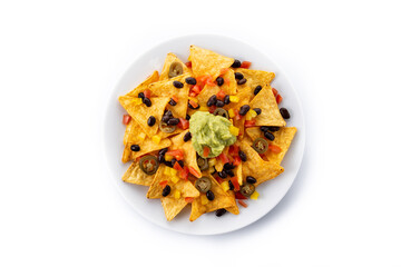 Mexican nachos tortilla chips with black beans, guacamole, tomato and jalapeno isolated on white background