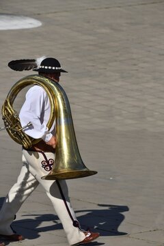 Polish Highlander Wearing A Tube On His Shoulder