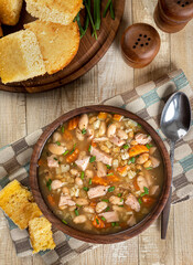 Bowl of ham and been soup