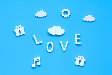 the symbol of the holiday of love. two hearts, love, gifts, notes, blue sky, clouds and sun