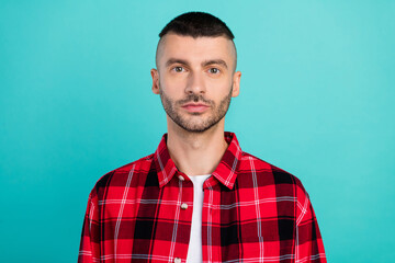 Fototapeta premium Photo of nice young brunet guy wear red shirt isolated on teal color background