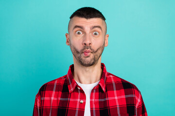 Photo of young happy funky positive fooling man make funny face enjoy isolated on teal color background