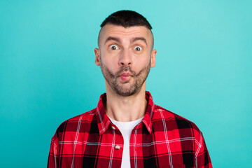 Fototapeta premium Photo of young happy funky positive fooling man make funny face enjoy isolated on teal color background