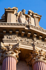 Man figure atop the pillar of the Palace of Fine Arts rotunda