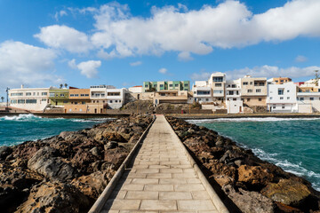 Pozo Izquierdo overlook with breakwater with a sidewalk, Gran Canaria, Spain - obrazy, fototapety, plakaty
