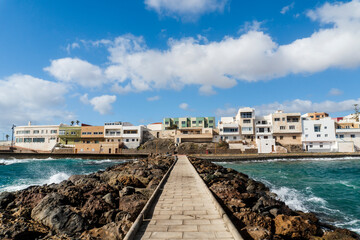 Fototapeta na wymiar Pozo Izquierdo overlook with breakwater with a sidewalk, Gran Canaria, Spain