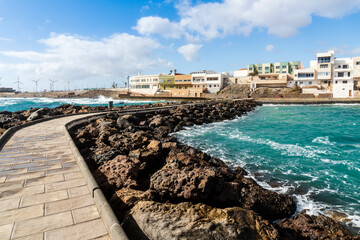 Pozo Izquierdo overlook with breakwater with a sidewalk, Gran Canaria, Spain - obrazy, fototapety, plakaty