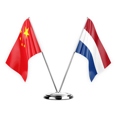 Two table flags isolated on white background 3d illustration, china and netherlands