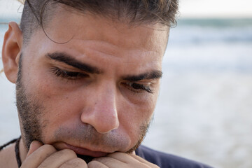 White male between 25 and 30 years old with a feeling of despondency or sadness. Depressive or introspective attitude