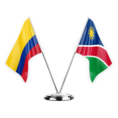 Two table flags isolated on white background 3d illustration, colombia and namibia