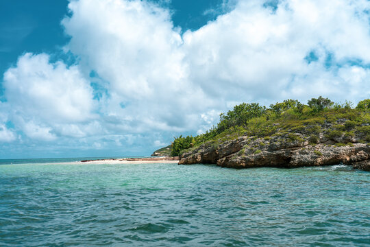 Green Island, a small and uninhabited island just off Nonsuch Bay, Antigua, Caribbean