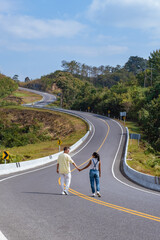 Road nr 3 in Nan Thailand country road rear view. Number three of road among the mountains at Nan,...