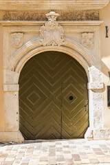 Old door with an interesting ornament, close-up.