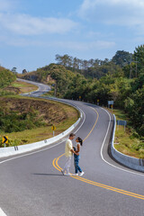 Road nr 3 in Nan Thailand country road rear view. Number three of road among the mountains at Nan,...