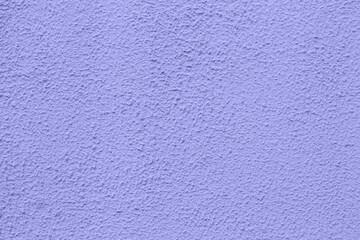 Color of the year 2022 very peri. Old plaster texture in trendy color of the year 2022 background