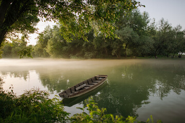 Boat on fogey river