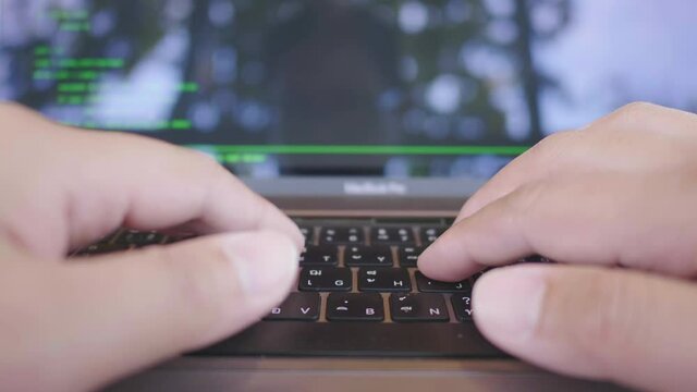 Close up hands typing on laptop at cafe, working at cafe.IT careers. Code development. Working as a programer freelance. working day concept