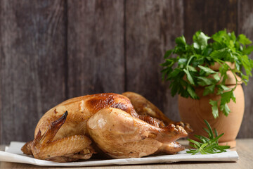 Whole roasted chicken. Close up, side view