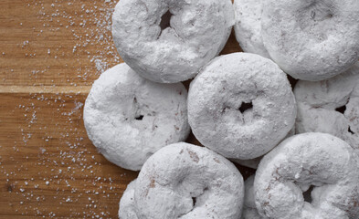 Fototapeta na wymiar Overhead view of powdered donuts or doughnuts