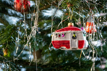 Sparkling Christmas Caravan mobile home balls and Christmas ornaments grant a festive Holy Eve in december and advent time with traditional decoration to celebrate xmas with hanging decor
