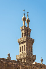 Fototapeta na wymiar Minaret of public historic Mamluk era Mosque of Qanibay AlRamah, Cairo Citadel Square, Old Cairo, Egypt
