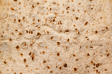 food background - close-up of thin lavash made from wheat flour