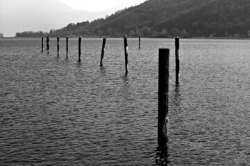 Italy: Wooden moorings on Garda Lake.