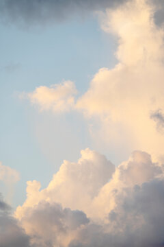 Soft White Clouds Against Light Sky