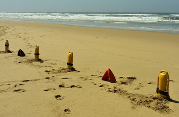 Life saver buoys and flippers brought to the ready in case a bather gets into trouble in the sea