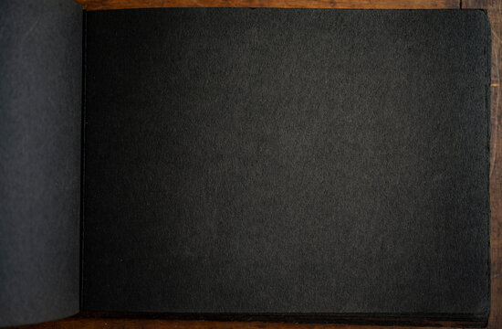 Close-up of black paper in photo album