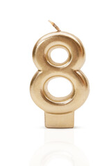 Gold number 8. Candle on white isolated background. International Women's Day, Birthday, Anniversary. Copy space