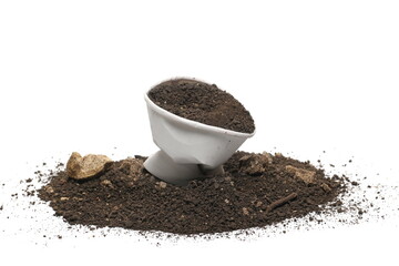 Disposable crumpled, paper cup  for throwing away and recycling and dirt pile isolated on white background, with clipping path, side view