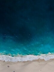 Fototapeta na wymiar Dramatic aerial of the beach
