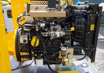 Modern powerful semi truck turbo diesel engine closeup.