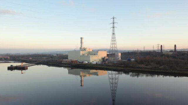 Power station producing energy on the banks of the River Foyle near Derry, Northern Ireland