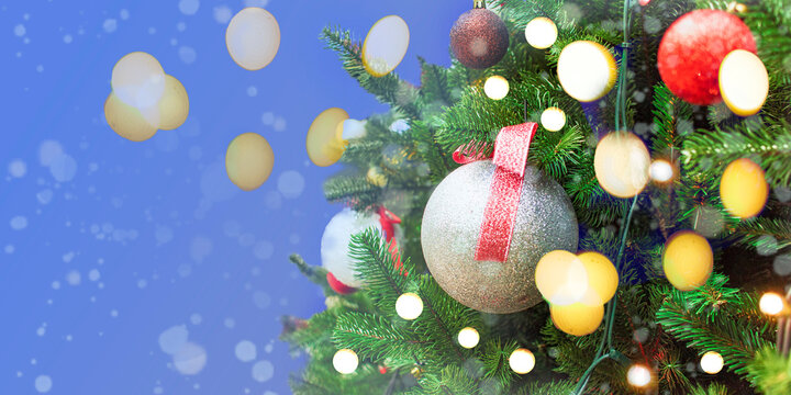 Decorated Christmas tree on blurred background with color very pery
