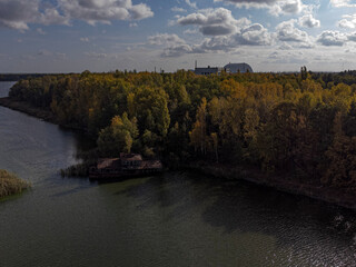 abandoned house in water in front of chernobyl nuclear reactor