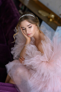 beautiful girl in a chic evening dress in a beautiful living room. Barbie image