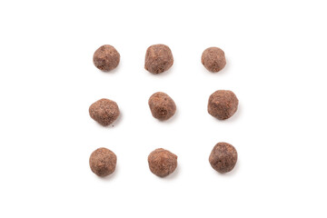 Cacao balls isolated on a white background.