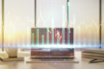 Double exposure of abstract creative financial chart on modern laptop background, research and strategy concept