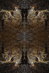 Alien Heads Sculpted in a Granite Rock, Symmetrical Kaleidoscope Mirror, Abstract Background.